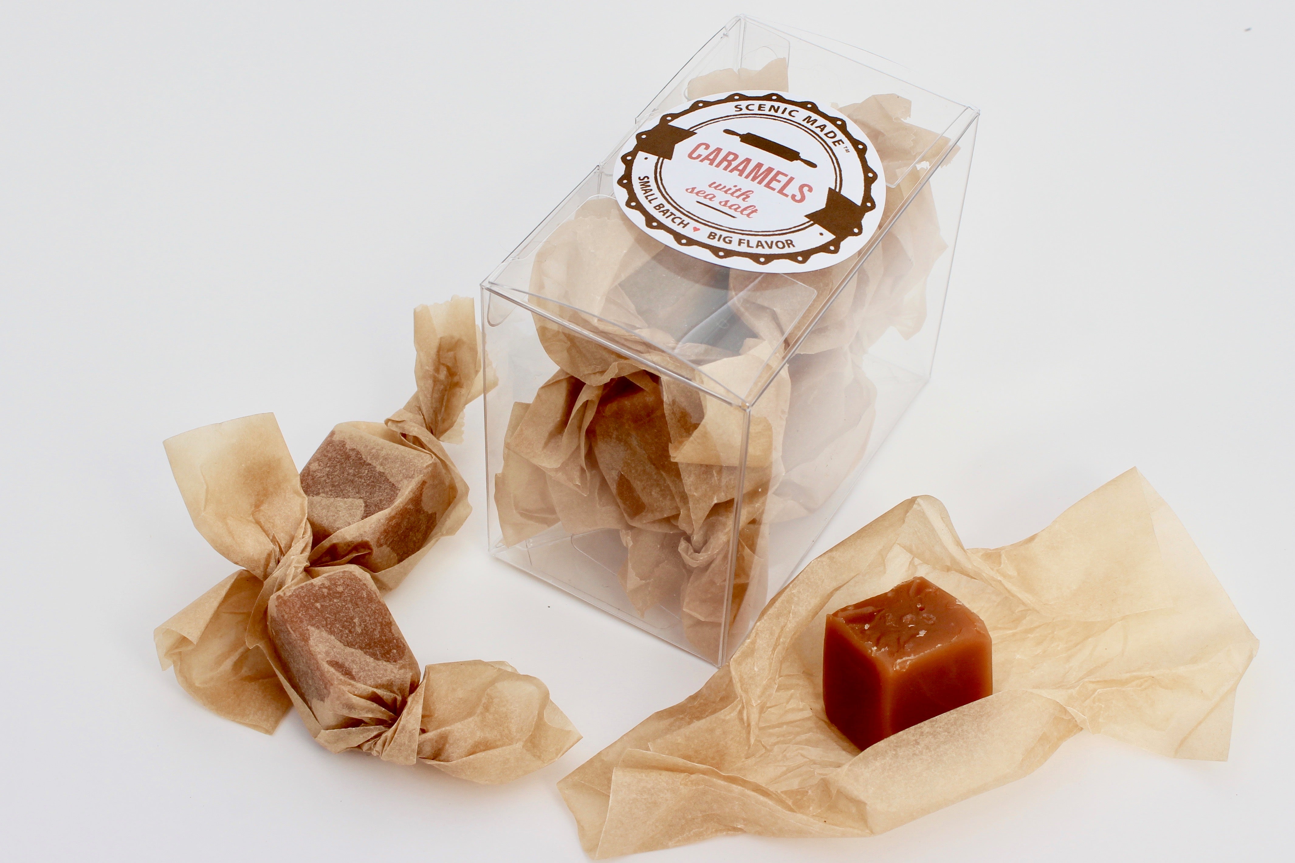 Sweet, chewy caramels, individually wrapped in unbleached parchment paper. 8 homemade caramels, individually wrapped and packaged in a clear, rectangular, food safe container with an attractive label on the front.