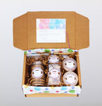 The birthday box includes chocolate chip cookies, molasses cookies, snickerdoodles, caramels. shortbread bites, chocolate oatmeal dream bars and granola in box with a personalized card. It's a party in a box!