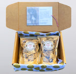 This box contains nothing more than our famous caramels. Each caramel is individually wrapped in unbleached parchment paper, then packed into 4 kraft bags with clear fronts. The bags are resealable and have an attractive label on the front. There are 60 d
