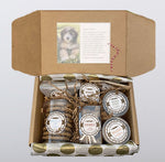 The dog Lover's box contains 2 kinds of yummy treats for your dog and 5 tasty treats for the human. There's something for everyone in this box, complete with a personalized card.