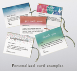 Examples of personalized cards with stock borders across the top.  Choose from balloons, confetti, or watercolor effects in blue, green or peach.  The card is enclosed in a translucent envelope inside the box top flap.  Bakers twine allows the card to be pulled out and displayed on a bulletin board or refrigerator. 